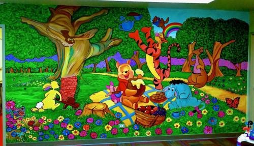 Winnie the pooh wall mural at a health club